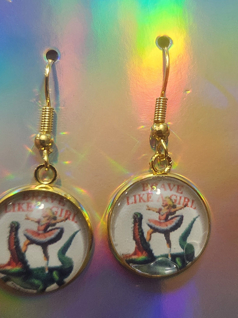 Gold Tone 'Brave Like a Girl' Illustration Drop Earrings